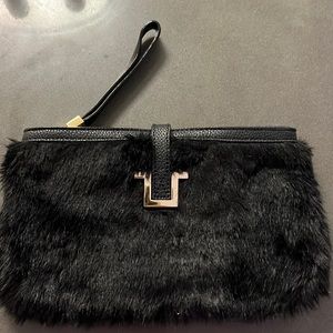 Fluffy black evening clutch